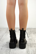 Black Patent Knitted Panel Cleated Platform Ankle Boots