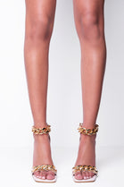 CREAM HIGH HEEL WITH ANKLE STRAP AND CHAIN DETAIL