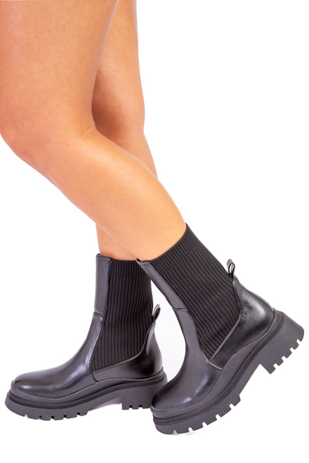 Black PU Chunky Ankle Boot With A Knitted Leg